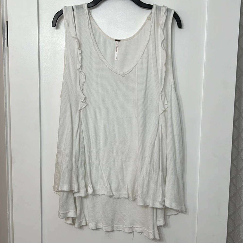 Free people creamy white ruffle tank. Size L.